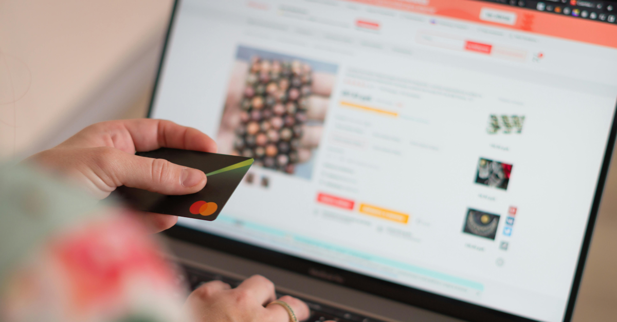 Online shopping holding a credit card